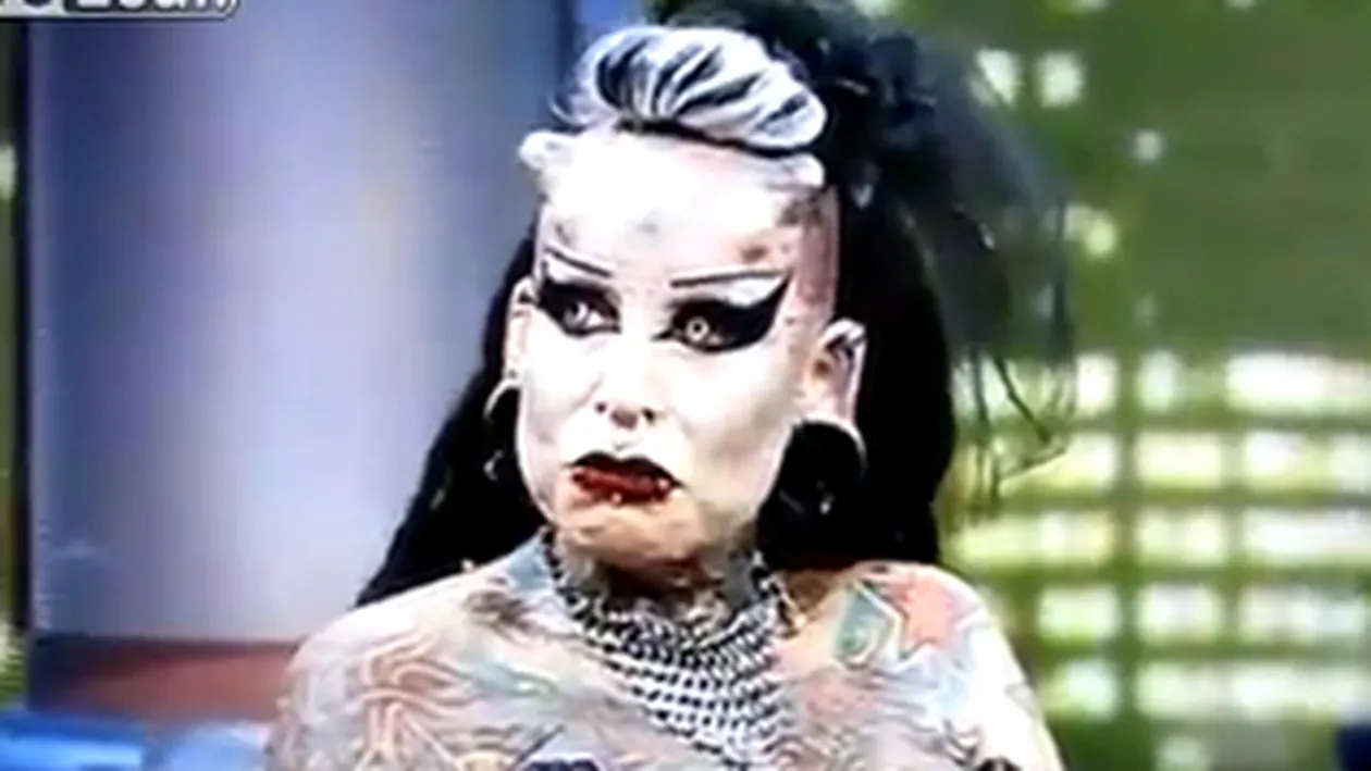 VIDEO Care iti va da cosmaruri! Femeia care a cheltuit 65.000 de dolari ca sa arate ca un drac!