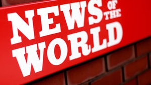 Un fost redactor-sef al News of The World, arestat in scandalul interceptarilor care au dus la inchiderea ziarului