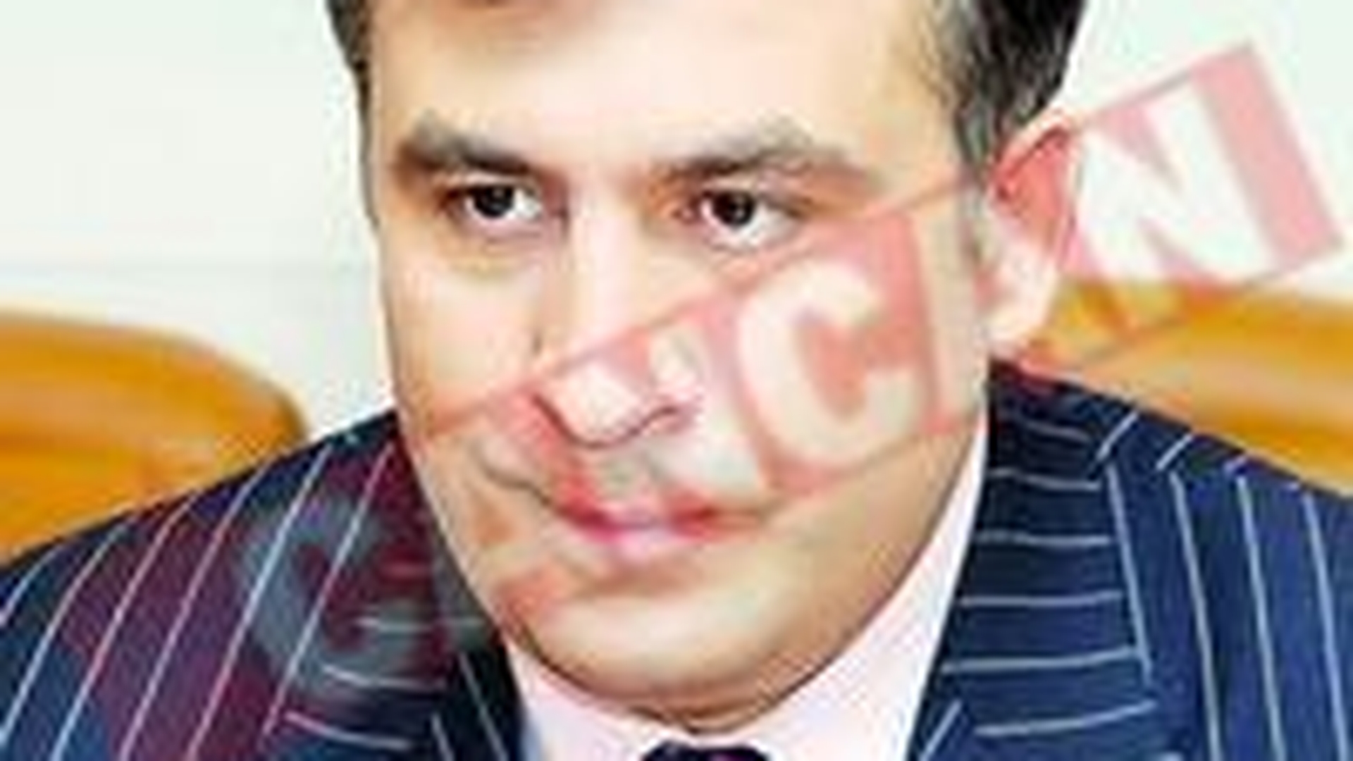 Putin il spanzura de "oua" pe Saakasvili