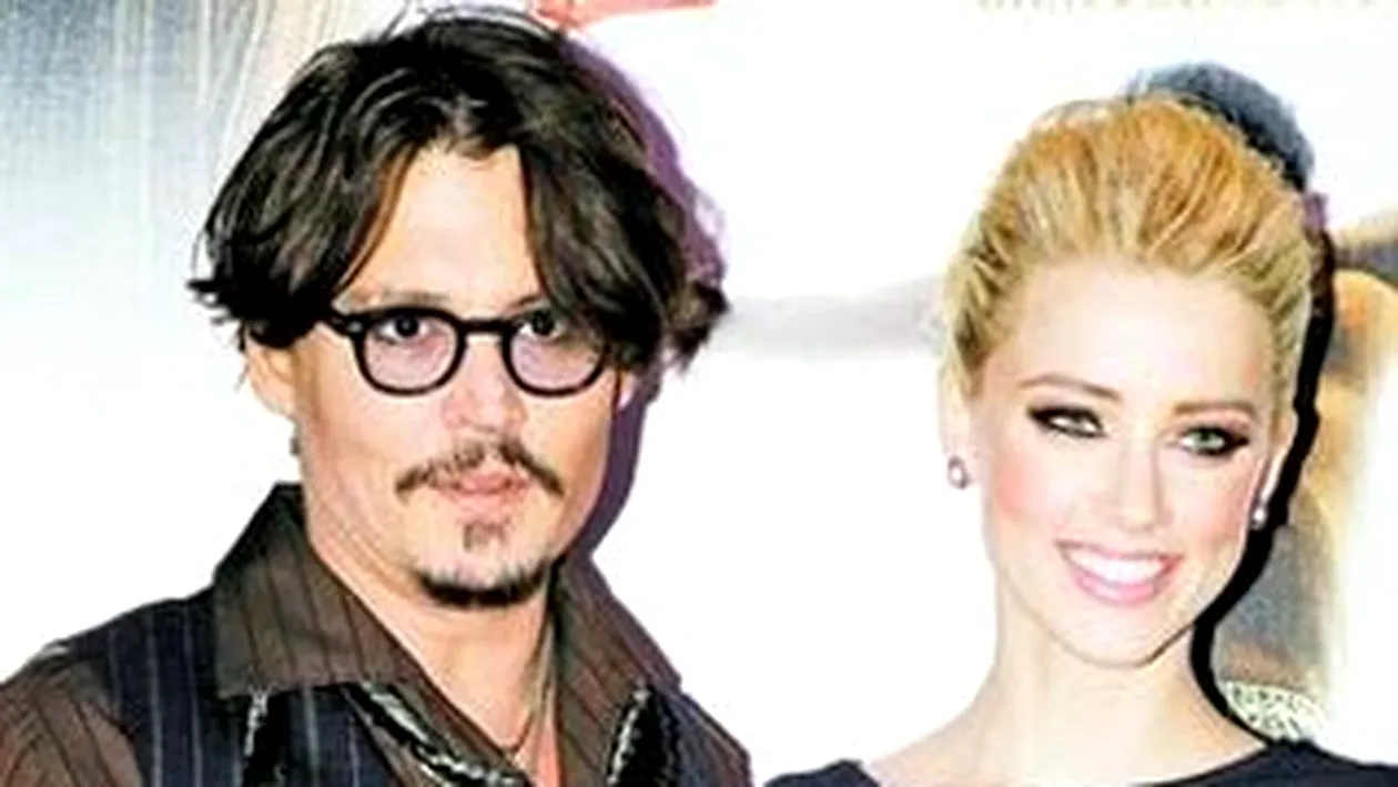 Amber Heard a primit binecuvantarea sa fie cu Johnny Depp... de la fosta ei iubita!