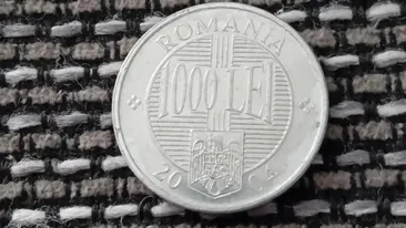 Mai ai așa ceva acasă? Prețul ireal la care se vinde o monedă de 1.000 de lei din anul 2004, acum, la două decenii distanță