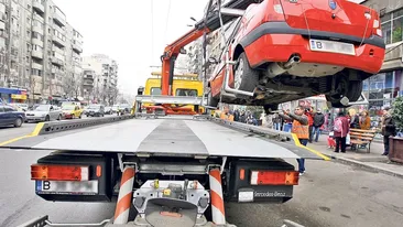 Aveți grijă unde vă parcați autoturismul! Legea privind ridicarea mașinilor parcate pe trotuare sau spații verzi a fost promulgată