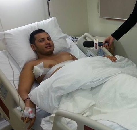 Adrian Pescariu, imediat după operaţia de implant de silicon în bust, în 2013