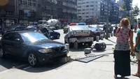 Un BMW, un Maserati si un Logan de politie s-au facut PRAF pe Magheru! Imagini de la loculul accidentului