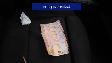 Acțiune în forță a polițiștilor! Trei bărbați, ridicați pentru că au pus în circulație bancnote false de 50 de euro