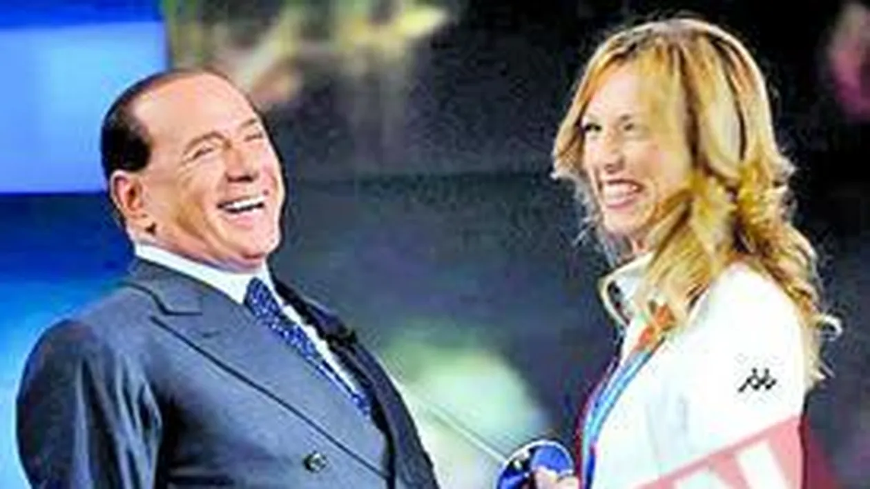 Berlusconi flirteaza in direct pe sticla
