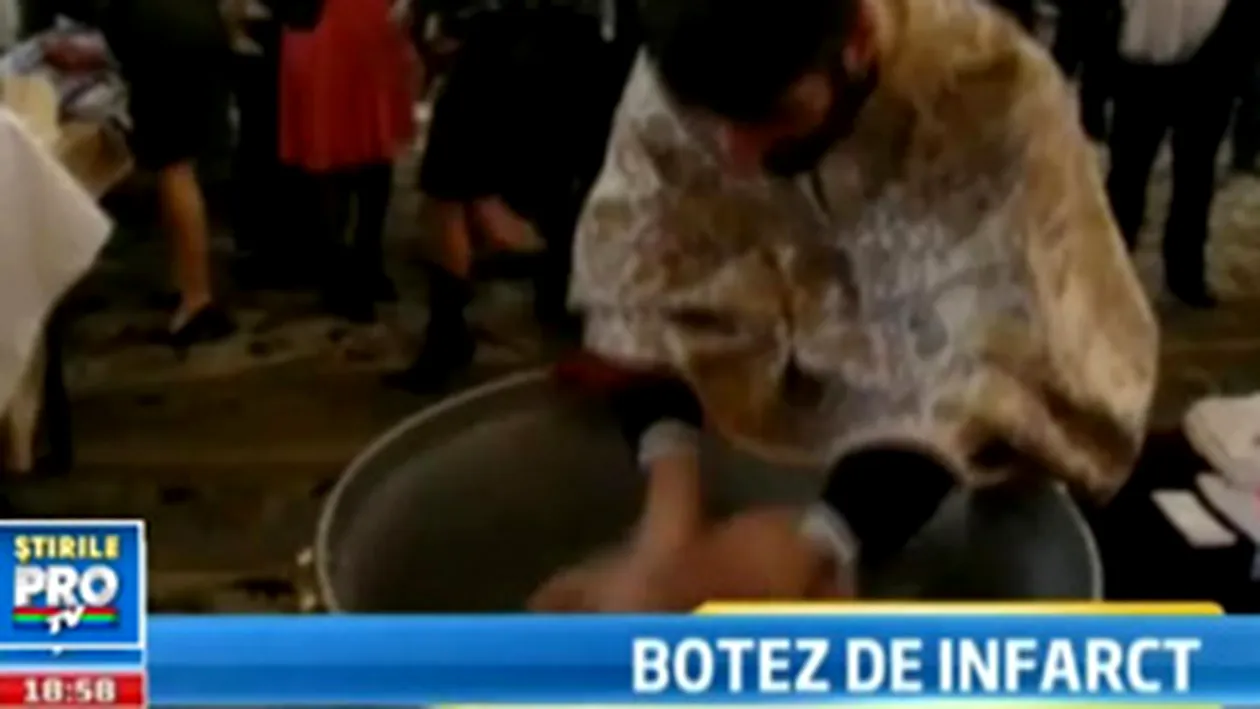 VIDEO Preot acuzat de tentativa de omor, dupa ce era sa inece o fetita in cristelnita, la botez!