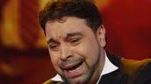 “Dedicatie” in stil mafiot pentru Florin Salam. I-au lasat doi trandafiri negri pe masina