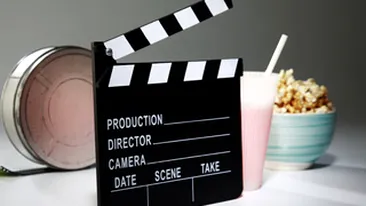 Romanii devin obezi la film! In doua zile, intr-un singur cinematograf se consuma 550 kg de floricele si 3.500 litri de suc!