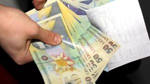 Bani în plus pentru angajații care au salariul mai mic de 6.000 de lei. Când se face plata