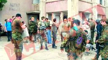 Brigazi inarmate au invadat cladirile parasite din Capitala