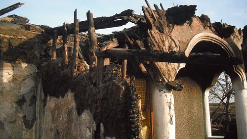 Imaginea pe care nu o va uita niciodată! Ce a fotografiat o femeie pe un perete, după ce i-a luat foc casa