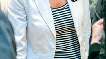 Andreea Raicu isi poarta numele la gat!