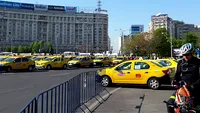 Zeci de taximetrişti şi transportatori protestează în Piaţa Victoriei!