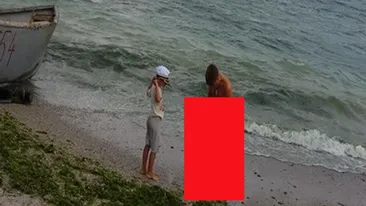 Asa ceva e strigator la cer! Ce a facut acest barbat pe plaja din Vama Veche, de fata cu fiul sau! VIDEO