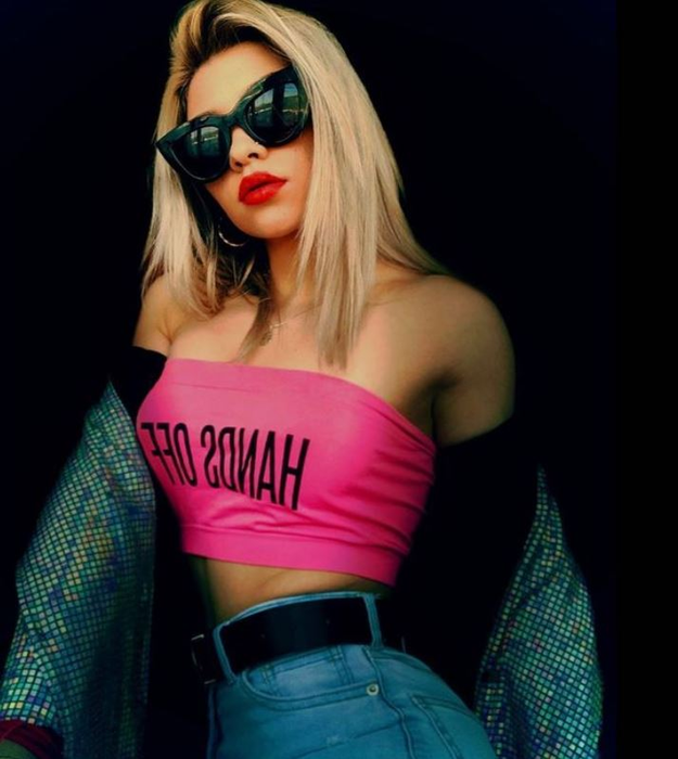Cine e Mihaela Cambei, tânăra care a luat argint la Jocurile Olimpice. E de o frumusţe răpitoare