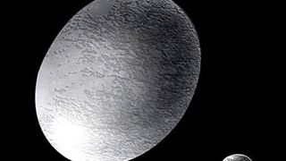 Haumea, o planeta pitica din sistemul nostru solar, este acoperita cu cristale de gheata