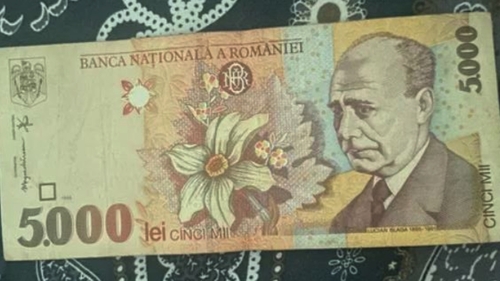 Te-ai putea îmbogăți! Prețul absurd la care se vinde o bancnotă de 5.000 de lei aflată în stare perfectă
