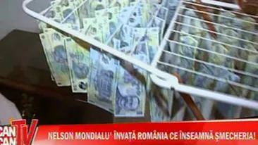 VIDEO Credeai ca le-ai auzit pe toate? Nelson Mondialu' a remorcat o masina cu lantul de aur de la gat! Are bijuterii si ghiuluri cat sa rivalizeze cu o casa de amanet!