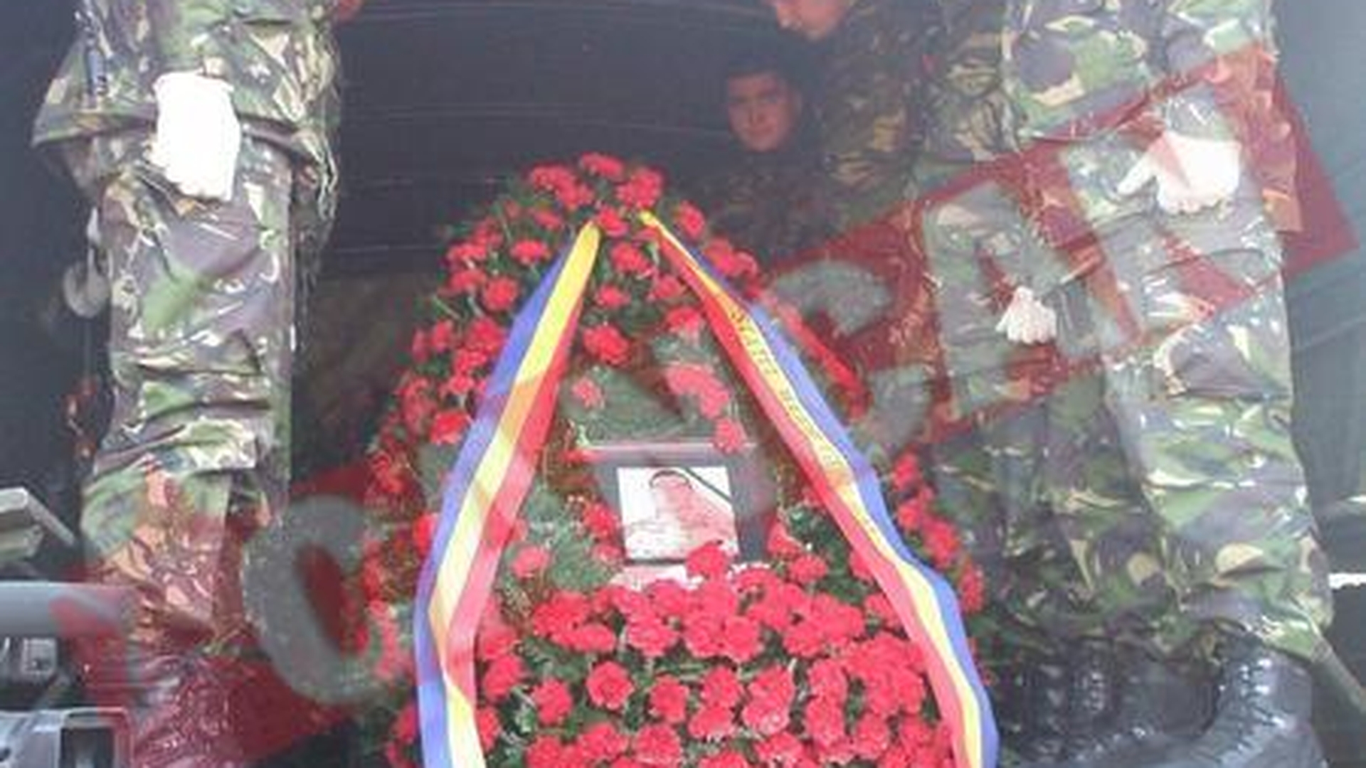 Trupul militarului ucis in Afganistan a fost adus acasa