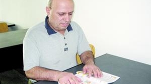 Un puscarias de 61 de ani, in clasa a III-a