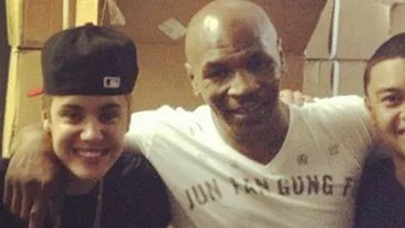Bieber s-a antrenat cu Mike Tyson inainte sa atace un fotograf