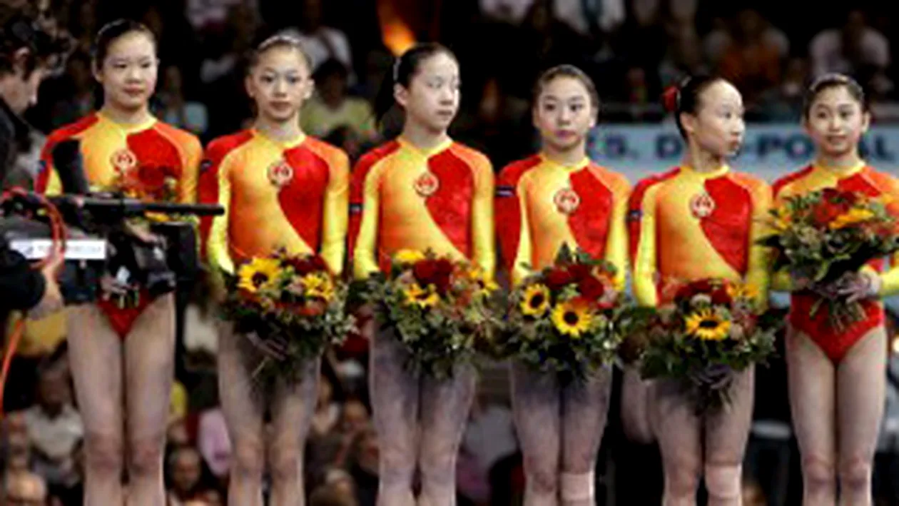 Chinei ii va fi retrasa o medalie,la poba feminina pe echipe, la gimnastica