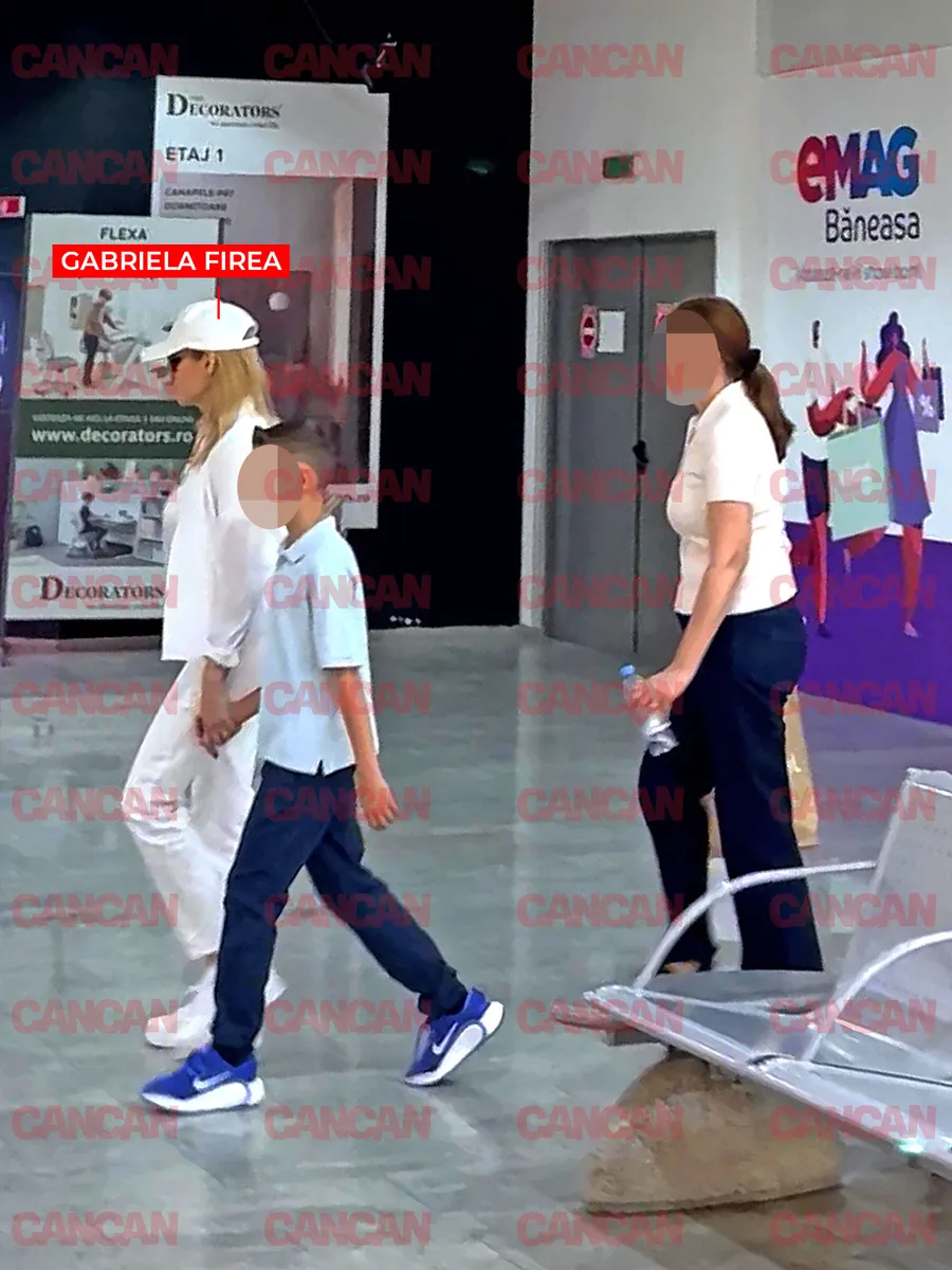Gabriela Firea la mall cu fiul și bona