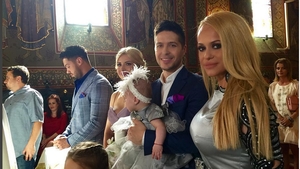 Tensiuni la botezul fetiţei ANDEI ADAM! Vedeta a plâns la creştinarea micuţei EVELIN