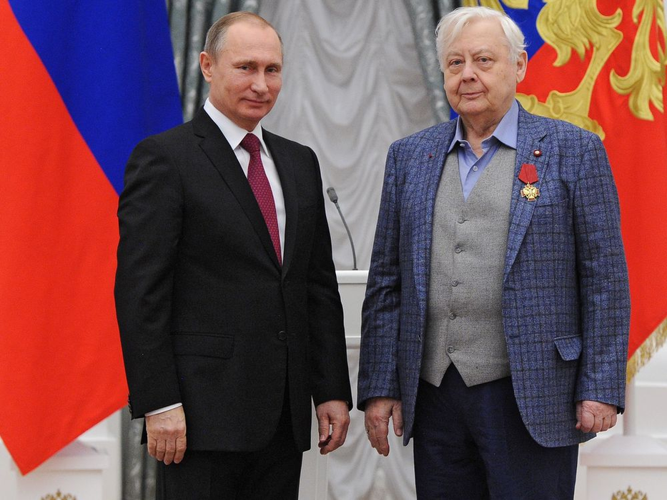FILE In this file photo taken on Thursday, Dec. 10, 2015, Russian President Vladimir Putin, left, gives a medal to artistic director of the Chekhov Moscow Art Theater Oleg Tabakov during an award ceremony in the Kremlin in Moscow, Russia. Oleg Tabakov, a Russian actor and theater director who has been one of the most revered figures in the Russian theater community and film industries for decades, has died. He was 82. (Mikhail Klimentyev/Sputnik, Kremlin Pool Photo via AP, File)