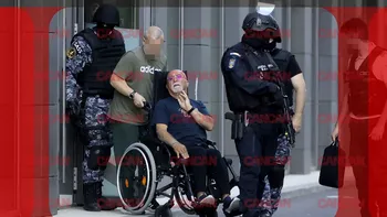 Omar Hayssam, în scaunul cu rotile și flancat de mascați! CANCAN.RO a surprins ACȚIUNEA SECRETĂ: ce se întâmplă cu primul terorist al României