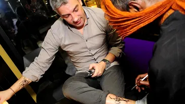 Fostul iubit al Luminitei Anghel, pictat pe picior si pe mana! Sanchi s-a tatuat in public