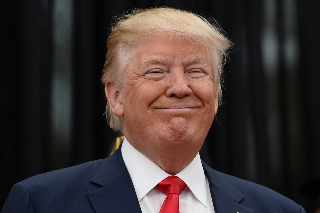 Republican presidential candidate Donald Trump waits to  speak as he is introduced at the New York Veterans Police Association during a campaign event in the New York City borough of Staten Island, NY, on April 17, 2016. New York State Primaries will held on April 19, 2016. (Photo by Anthony Behar) *** Please Use Credit from Credit Field ***