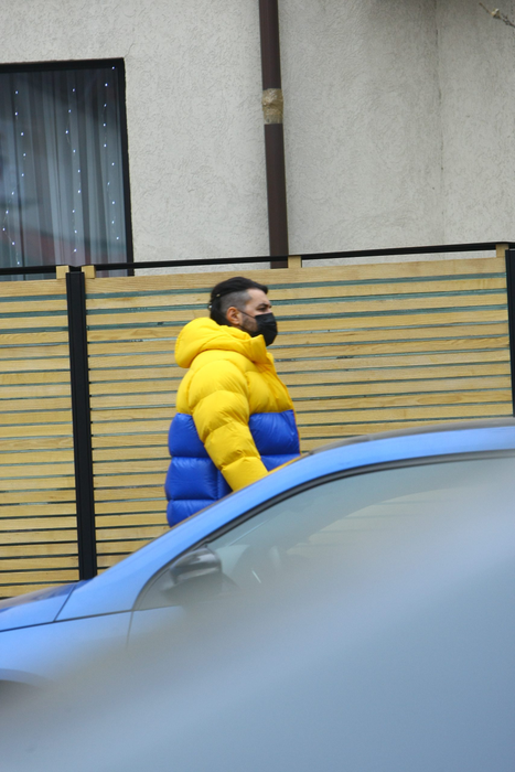 Smiley, în timp ce se îndrepta spre mașina lui