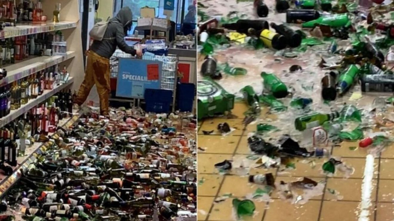 Scene șocante într-un supermarket. O femeie a spart 500 de sticle de alcool