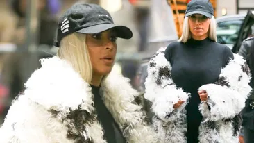 Inca n-a scapat de kilogramele in plus dupa nastere. Vezi cum incearca Kim Kardashian sa-si mascheze burtica