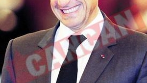 Sarkozy umbla cu trei celulare la el