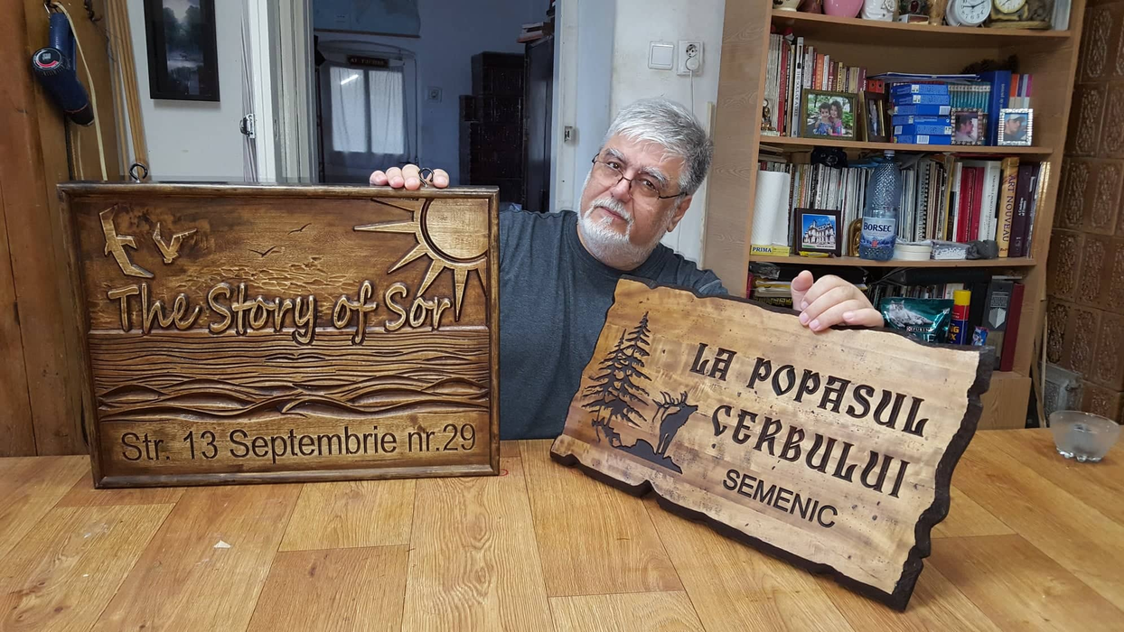 Artistul oltean a reînviat moda firmelor stradale sculptate