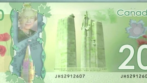 VIDEO Controversa! Trei femei dezbracate si Turnurile Gemene au fost tiparite pe bancnota canadiana de 20 de dolari