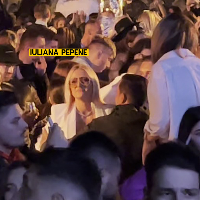 Iuliana Pepene pare puțin deranjată de gesturile prietenului (Foto: CANCAN.RO)