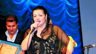 Catanga face mamaliga in fata clientului