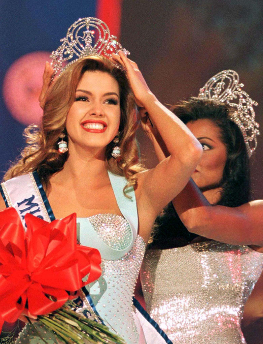 Miss Venezuela, Alicia Machado smiles after winning the 1996 ''Miss Universe'' crown May 17. Nineteen-year-old Machado, a model and first-year law and second-year business administration student will reign as the 4th Miss Universe from Venezuela - RTXGSFT