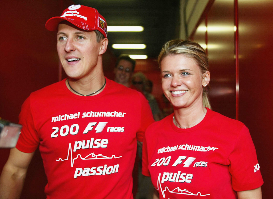 BARCELONA, SPAIN - MAY 9:  Michael Schumacher of Germany and Ferrari celebrates with his wife Corrina after competing in his 200th Grand Prix during the Spanish F1 Grand Prix on May 9, 2004, at the Circuit de Catalunya in Barcelona, Spain. (Photo by Getty Images)