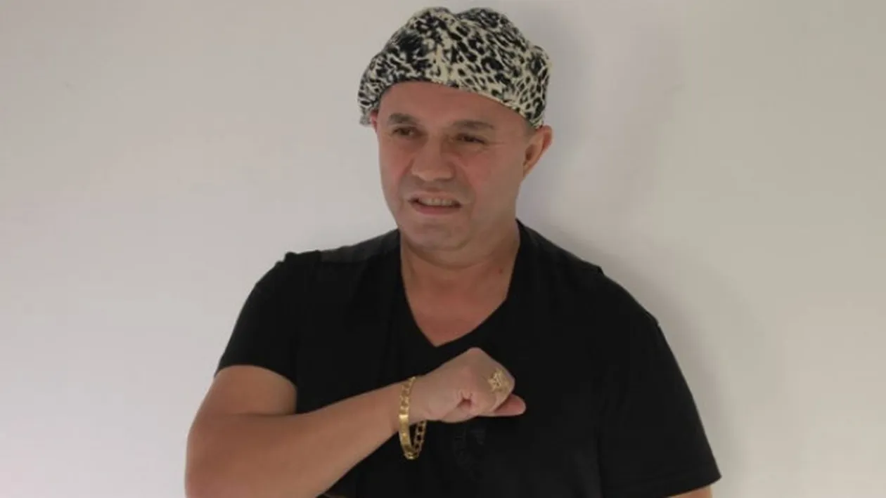 Cum a linistit Nicolae Guta un scandalagiu la o nunta din Petrosani. Se urcase pe casa si arunca cu tigle!