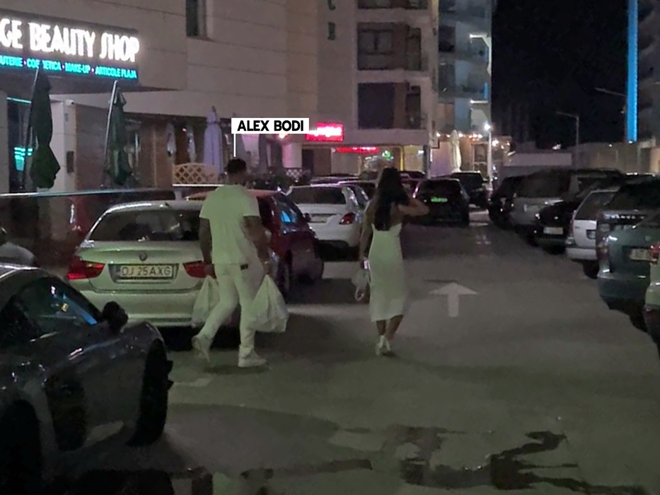 Alex Bodi și bruneta se îndreaptă către hotel