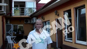 Varianta halucinanta a angajatului Loteriei Nationale, filmat facand striptease in fata institutiei: E o inscenare! Ma acuza ca l-am stropit pe soferul consilierului directorului general cu apa!