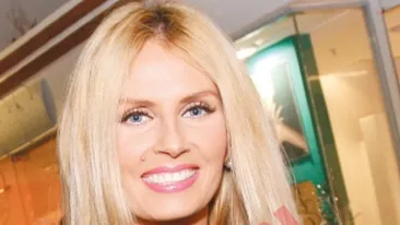 Iulia Albu are si ea banut cu chipul copilului