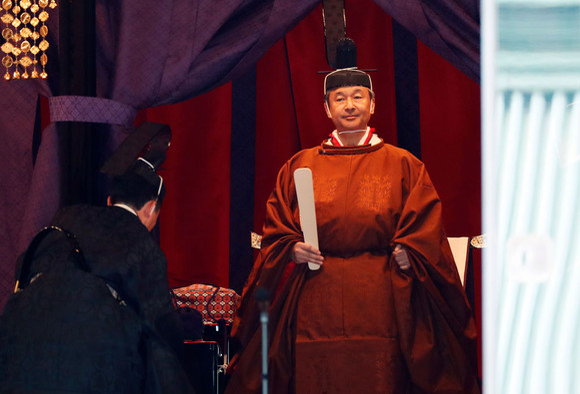 TOKYO, JAPAN - OCTOBER 22: Japan's Emperor Naruhito makes his appearance during a ceremony to proclaim his enthronement to the world, called Sokuirei-Seiden-no-gi, at the Imperial Palace on October 22, 2019 in Tokyo, Japan. (Photo by Issei Kato/Pool/Getty Images)