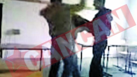 Batut cu pumnii de directorul scolii