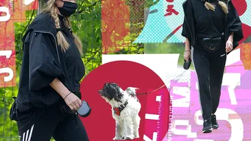Tania Budi și-a plimbat câinele în „stil ninja”.  S-a camuflat cu mască, ochelari, căciulă și...